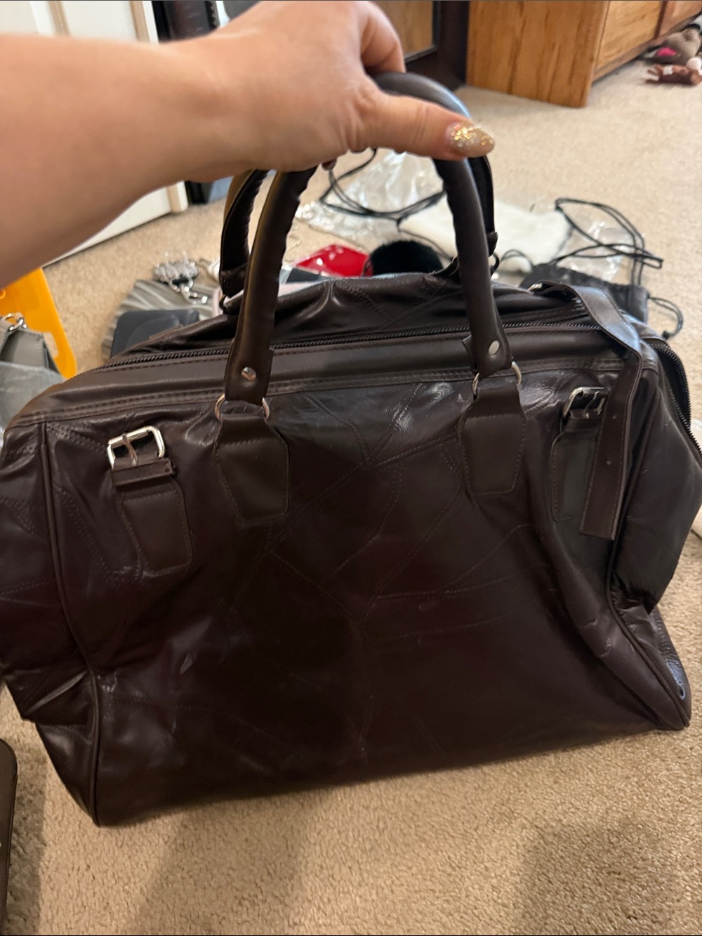 Men's Brown Leather Weekender Bag leather.
